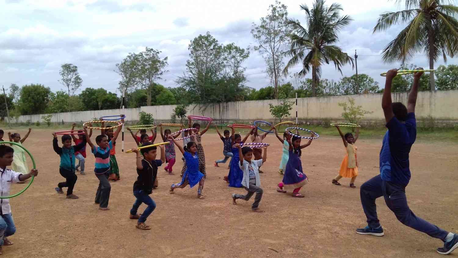 Children with hoops during exercise