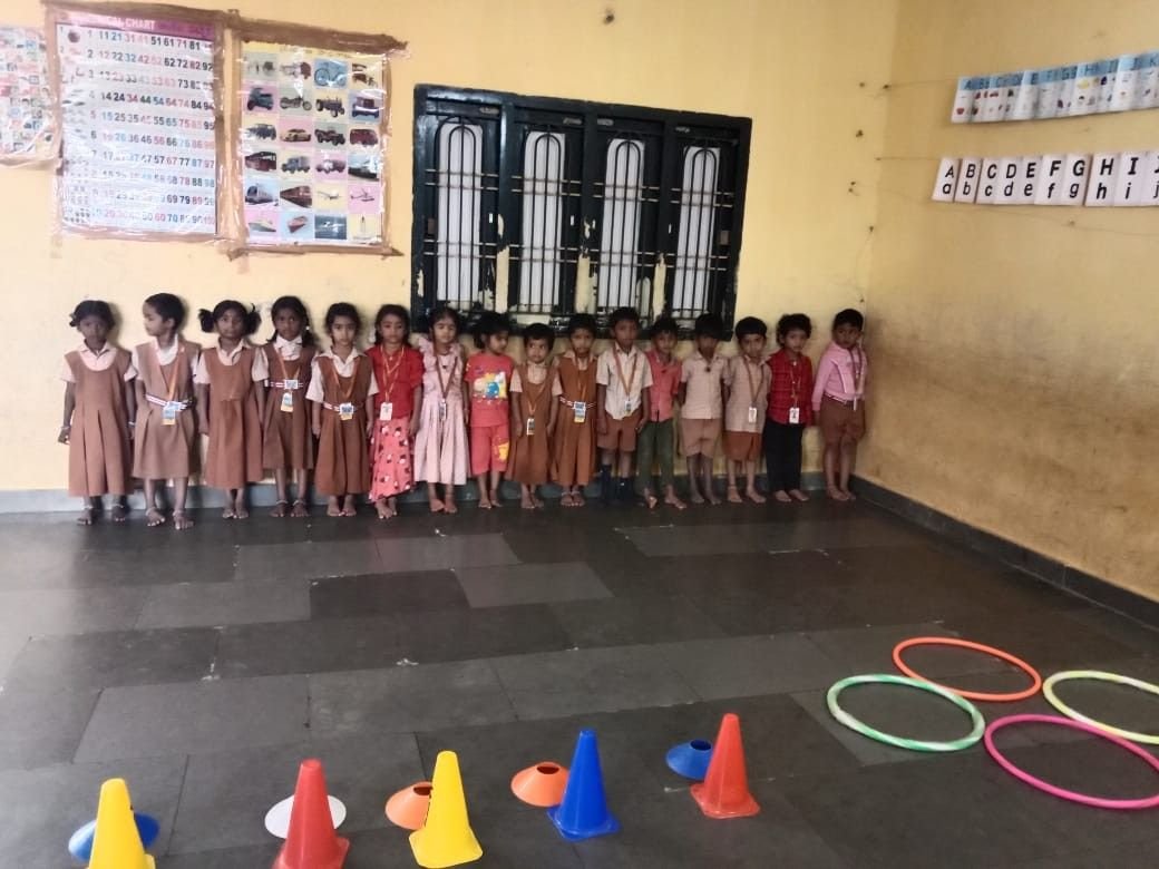 LKG students playing games
